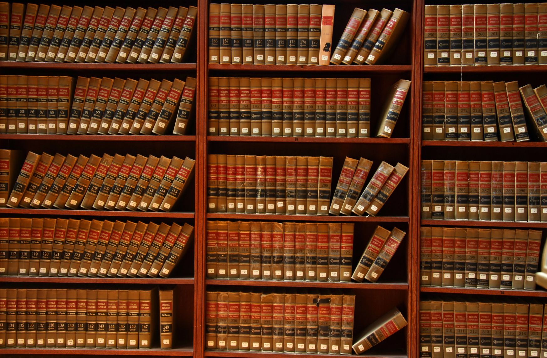 Legal books on shelves at a Littleton Law Firm